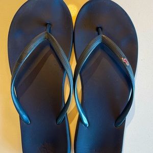 Blue Hollister flip flops